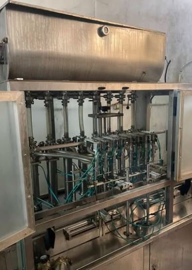 ماكينة تعبئة سوائل أوتوماتيك 8 نوز